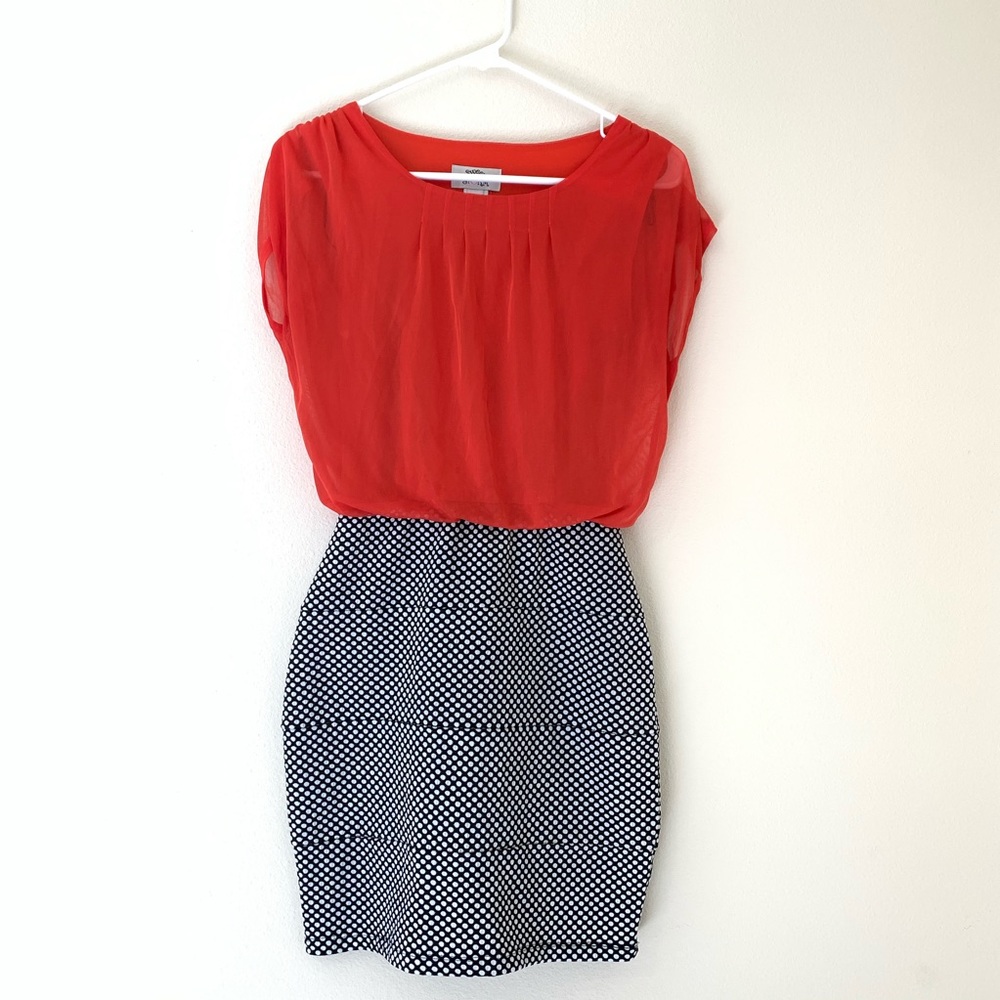 Red dress with black and white polka dot pattern